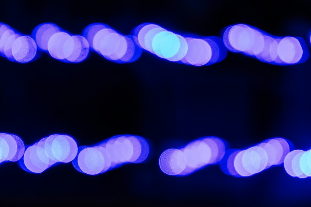 Blowjob-Themed Live Cams for Adults (18+) 25 Two rows of blue lights blurred against black