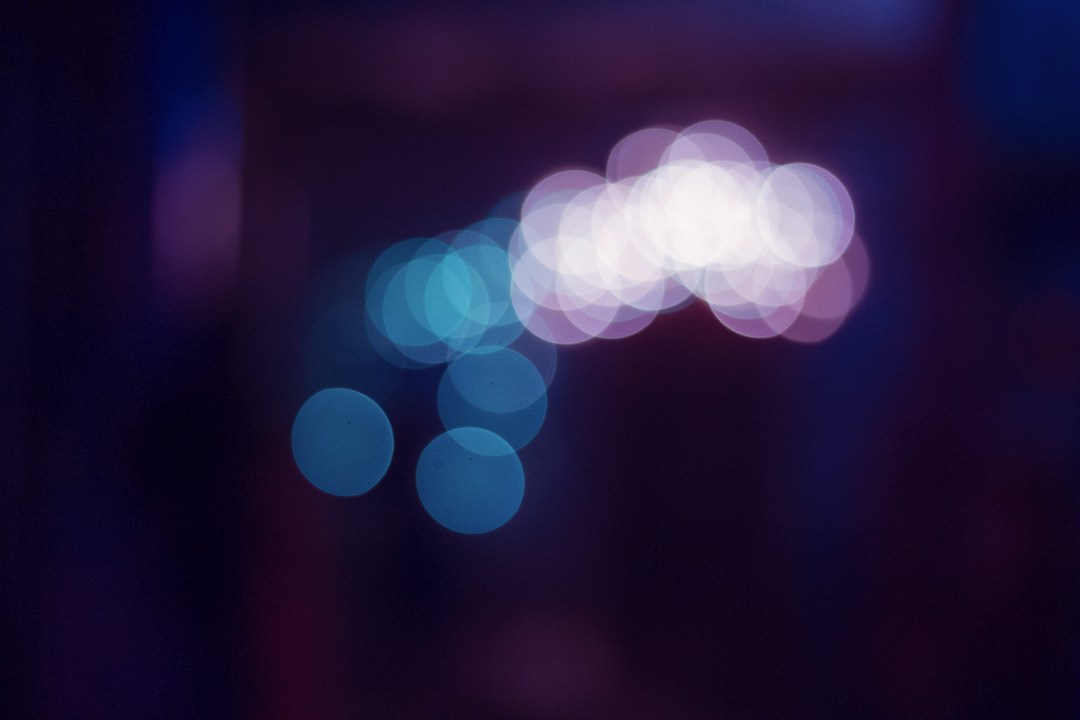 Blue and white lights blurred into a diagonal pattern