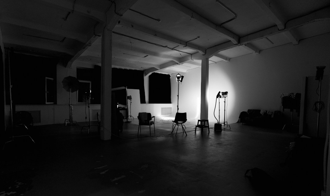 Empty photography studio with lighting equipment